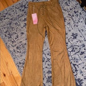 BRAND NEW. Brown suede flare pants